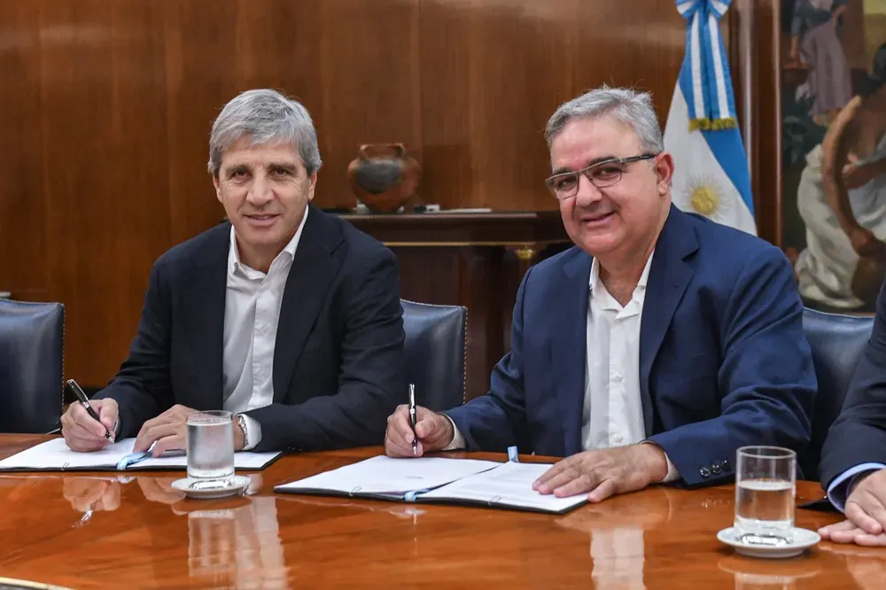 Luis Andrés Caputo y Raúl Alejandro Jalil.